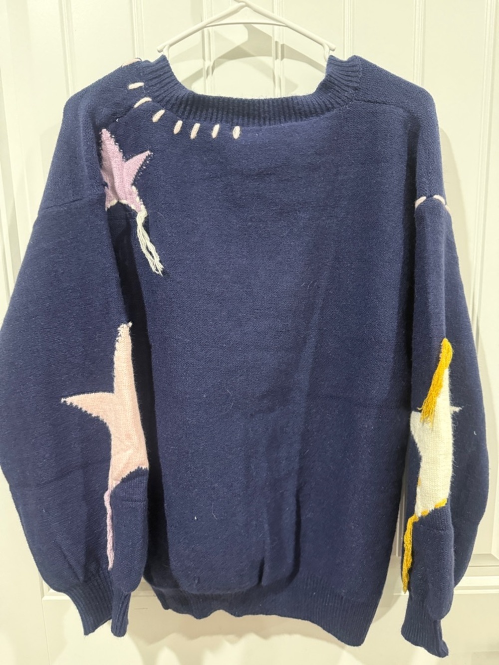 POL Navy V-Neck Star Appliqué Sweater with Yellow, Pink, and Cream Stars - Picture 2 of 5